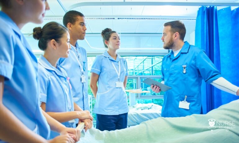 a group of nurses learning from an educating nurse